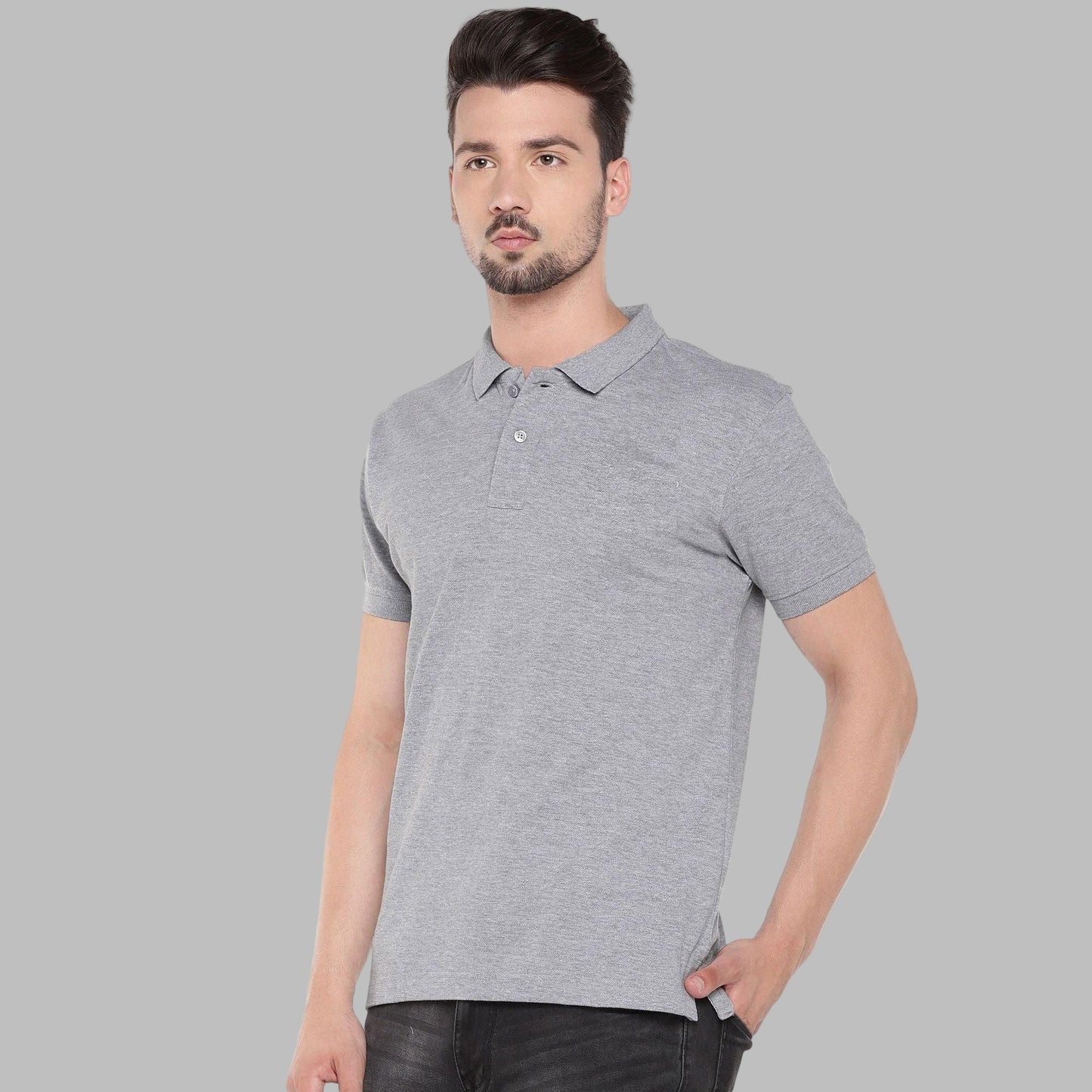 Man wearing a gray polo shirt on a white background