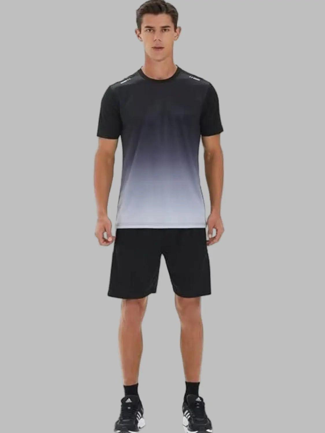 Man black and gray gradient t-shirt and black shorts