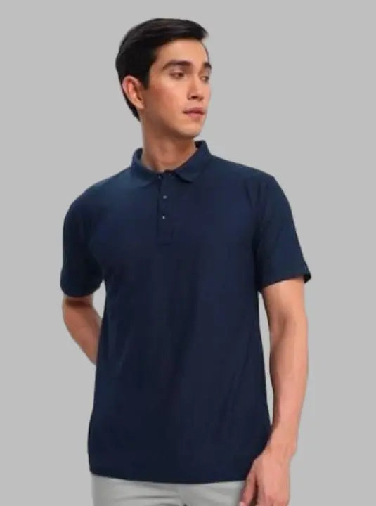 Man wearing a navy blue polo shirt on a white background