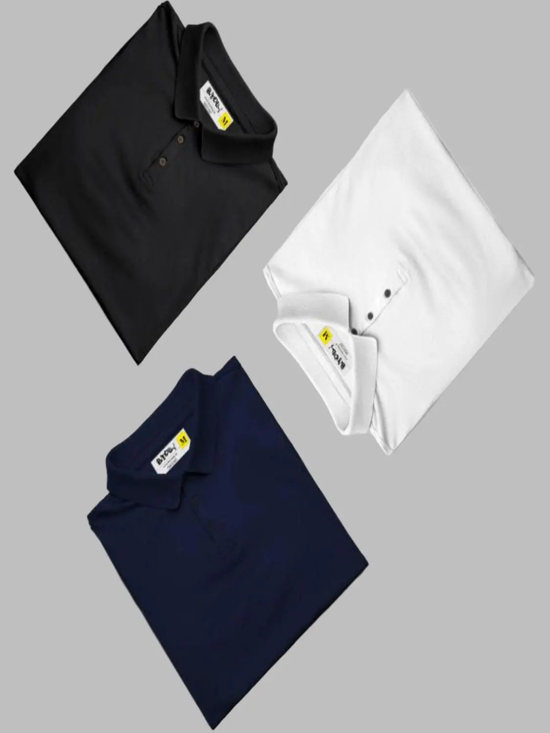 Two folded polo shirts, one black and one navy, on a light gray background.