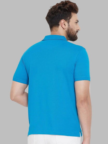 Man wearing a blue polo shirt on a white background