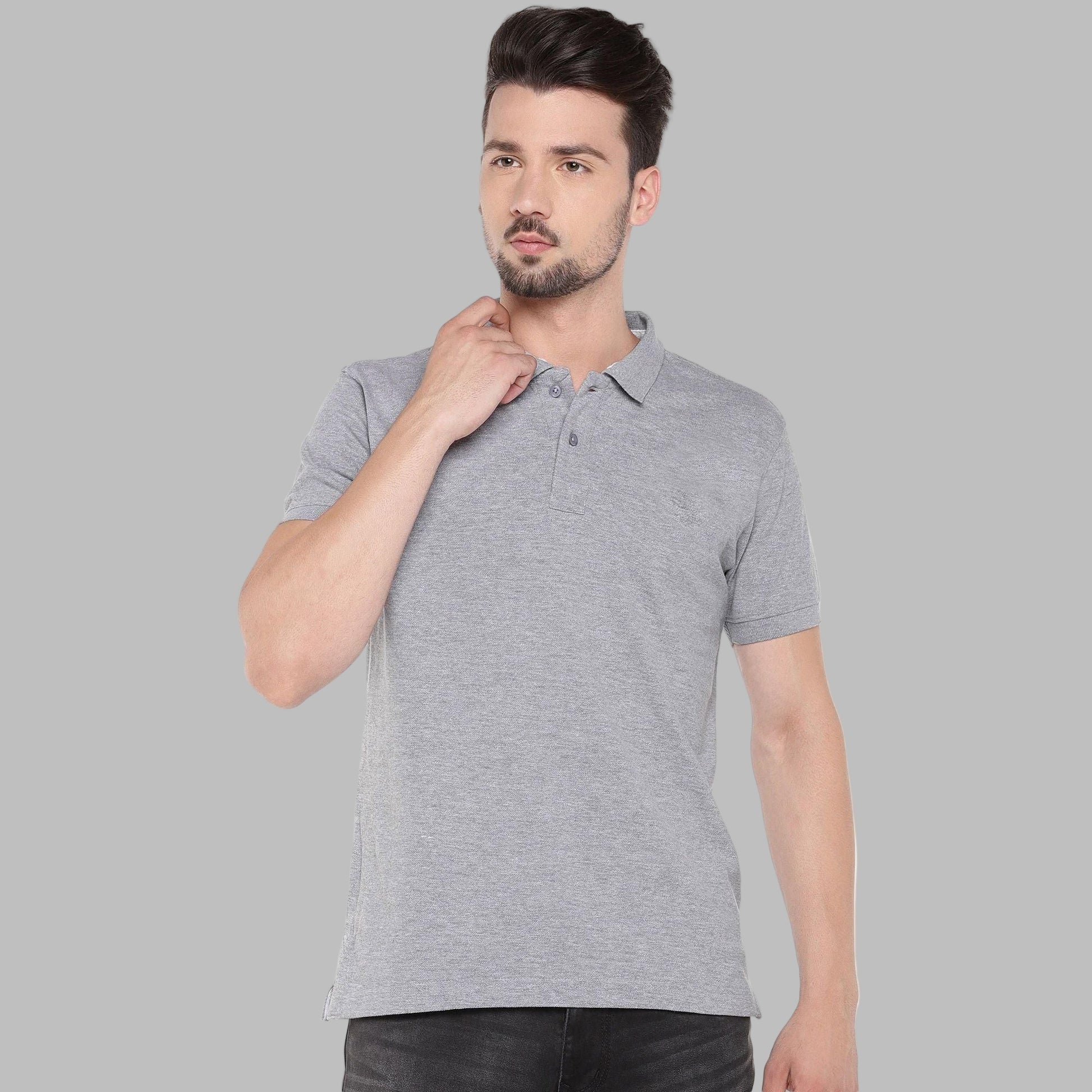 Man wearing a gray polo shirt on a white background